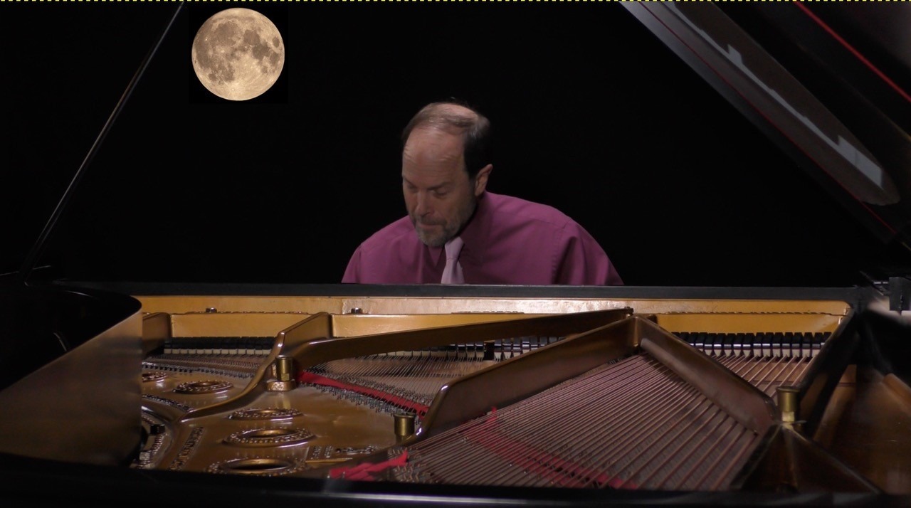 frederick moyer playing the piano