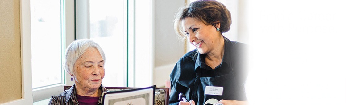 waitress taking a residents dining order